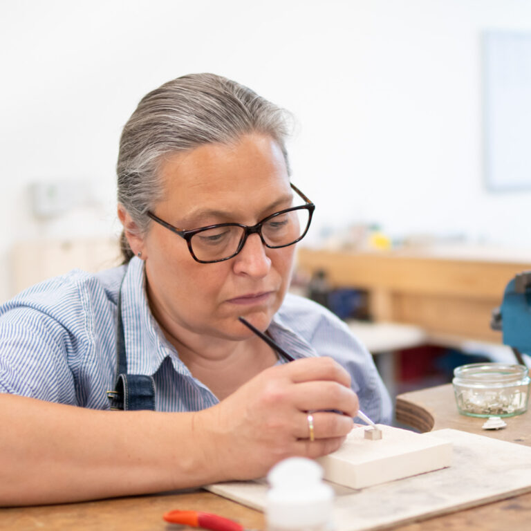 Nerissa at the jewellery bench