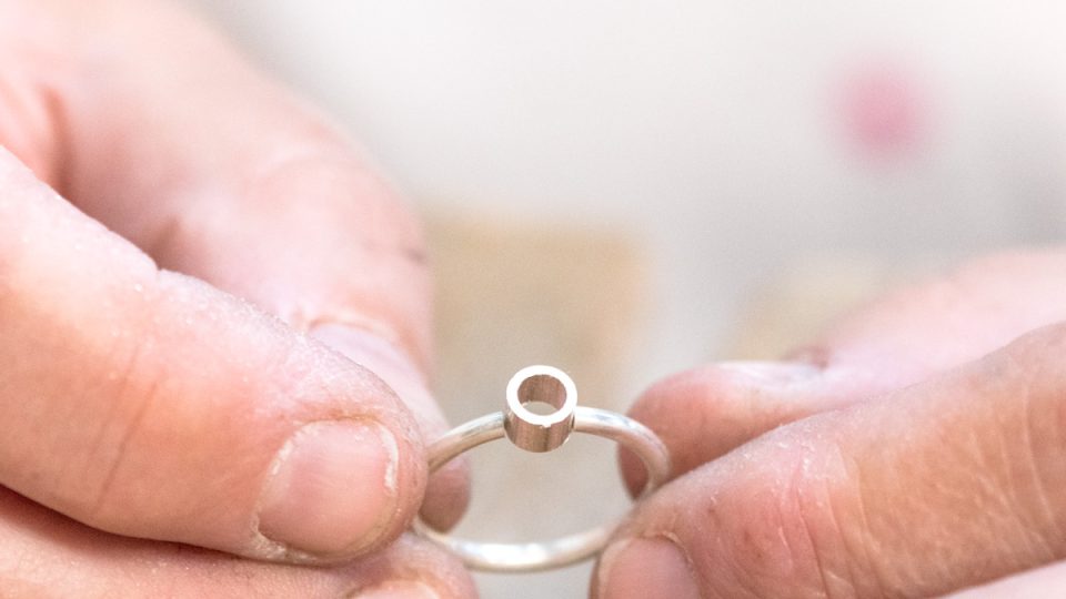 Silver ring with tube setting