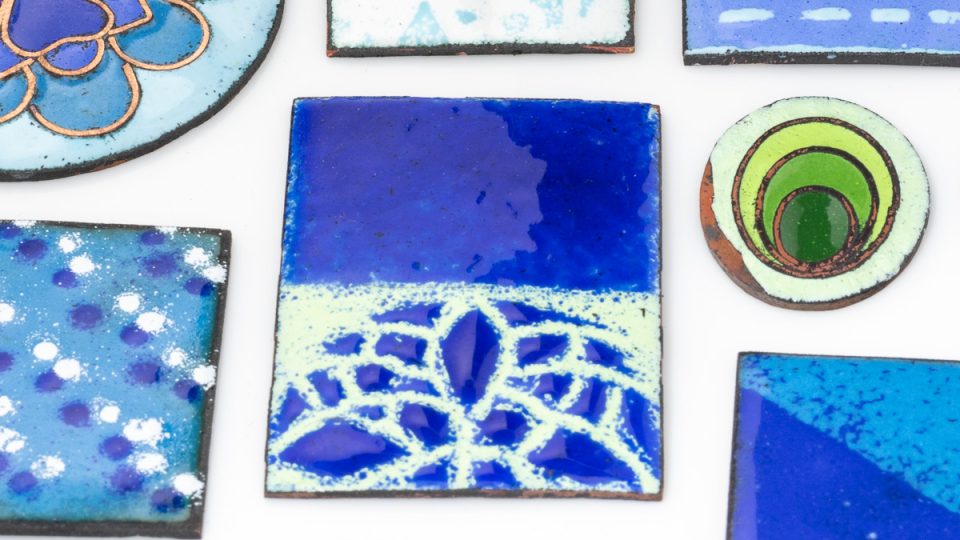 Various enamel sample pieces showing different patterns