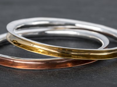 anticlastic silver bangles made on the anticlastic raising workshop