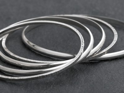 Silver hammer textured bangles