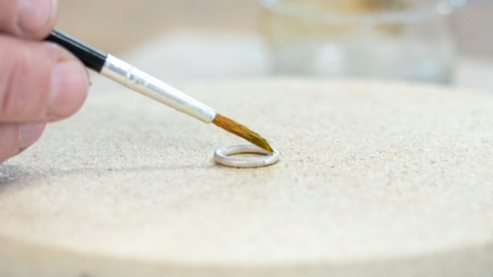 Applying solder to a silver hoop