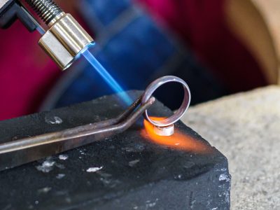 Silver setting being soldered to silver ring